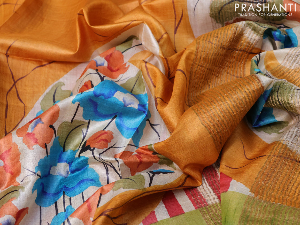 Pure tussar silk saree mustard yellow and teal green shade with floral hand painted prints and zari woven border