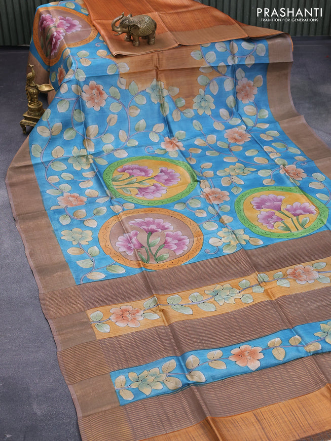 Pure tussar silk saree blue and pastel brown with allover floral kalamkari hand painted prints and zari woven border