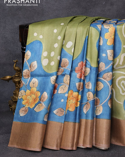 Pure tussar silk saree pastel green and blue brown with allover floral kalamkari hand painted prints and zari woven border