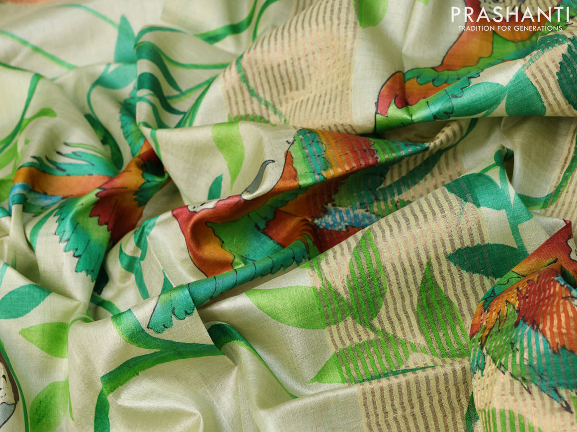 Pure tussar silk saree pista green and red with hand painted prints and zari woven border