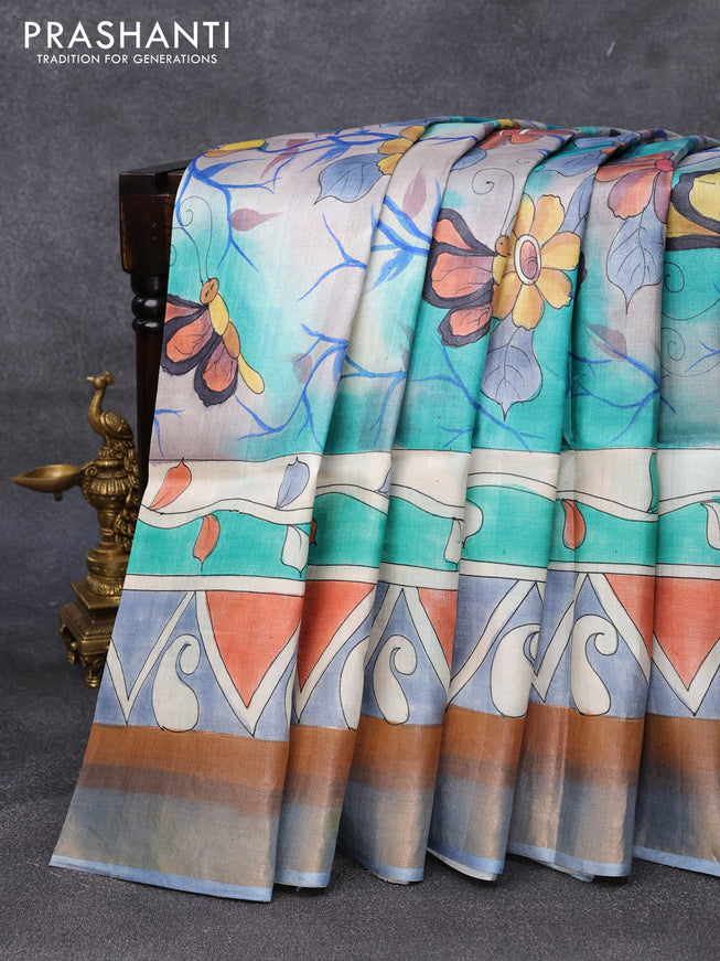 Pure tussar silk saree teal blue shade and multi colour with hand painted prints and zari woven border