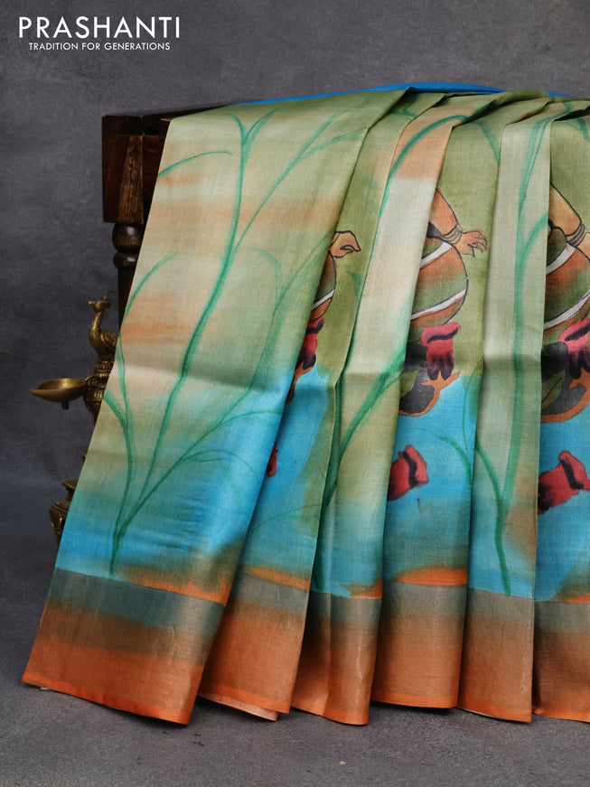 Pure tussar silk saree pastel green and blue rustic orange with hand painted prints and zari woven border