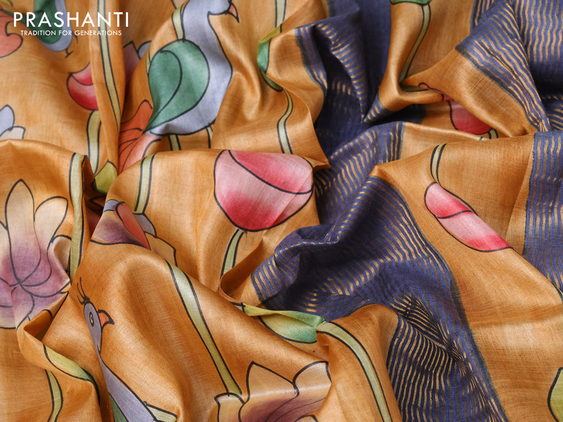 Pure tussar silk saree rust shade and blue with allover floral kalamkari hand painted prints and zari woven border
