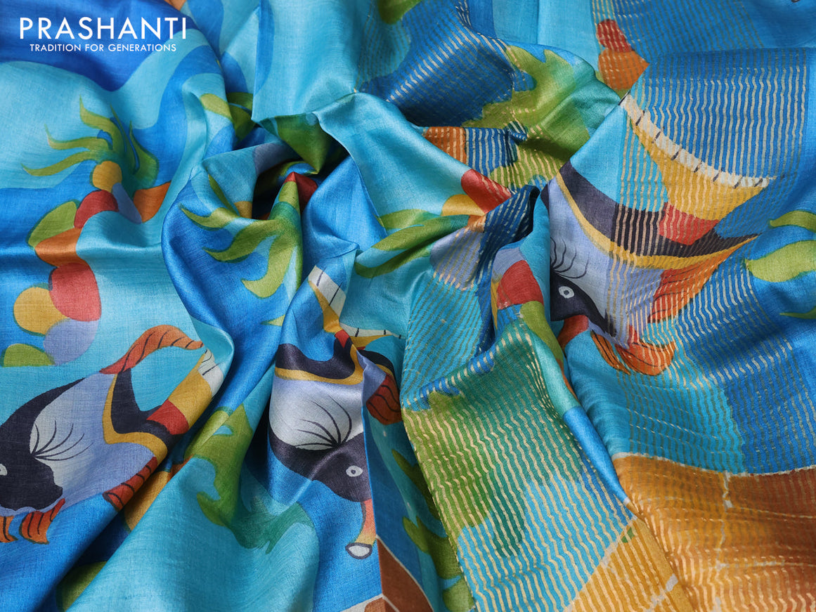 Pure tussar silk saree teal blue blue and rust shade with hand painted prints and zari woven border