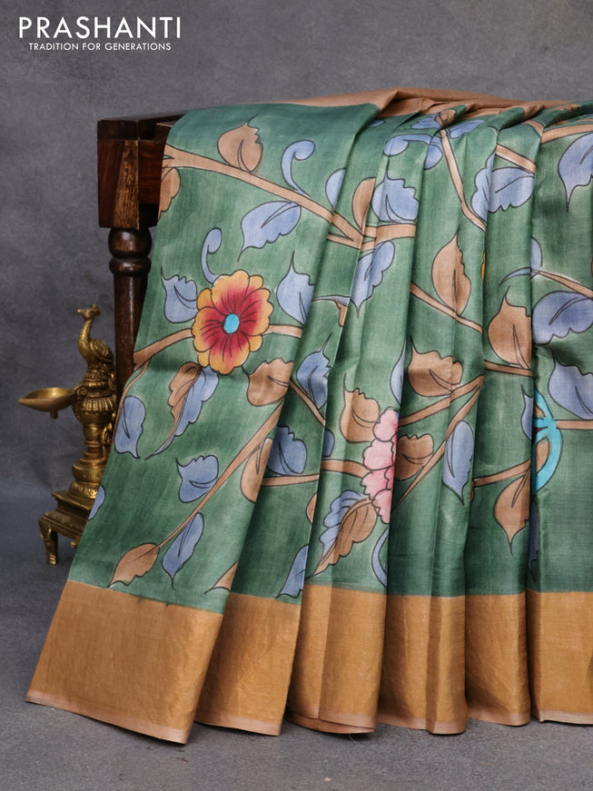 Pure tussar silk saree pastel green and pastel brown with allover floral kalamkari hand painted prints and zari woven border