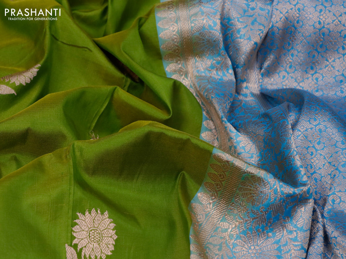 Banarasi katan silk saree mehendi green and light blue with copper zari woven floral buttas and floral zari woven border