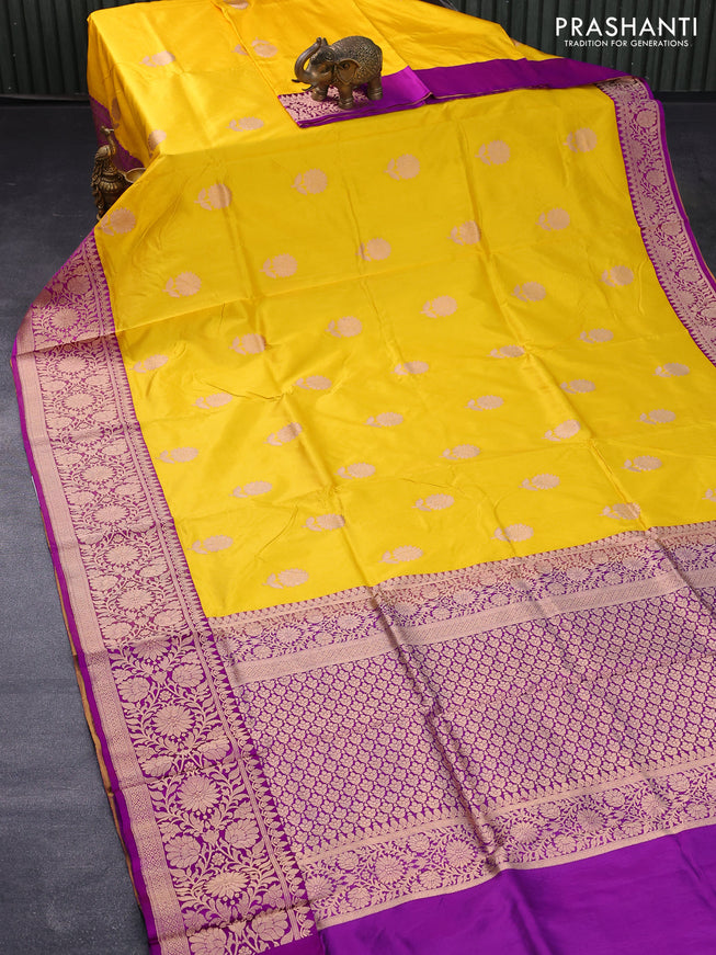 Banarasi katan silk saree mango yellow and purple with copper zari woven floral buttas and floral zari woven border