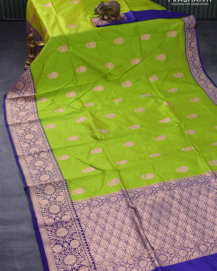 Banarasi katan silk saree light green and blue with copper zari woven floral buttas and floral zari woven border
