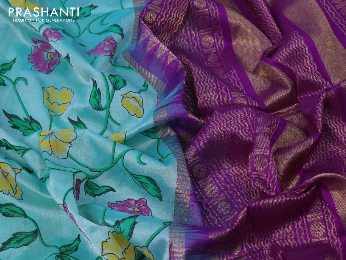 Silk cotton saree teal bluish green and purple with allover floral prints and rettapet zari woven korvai border