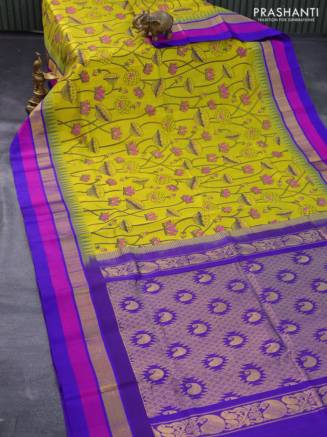 Silk cotton saree lime yellow and royal blue with pichwai prints and temple design zari woven simple border