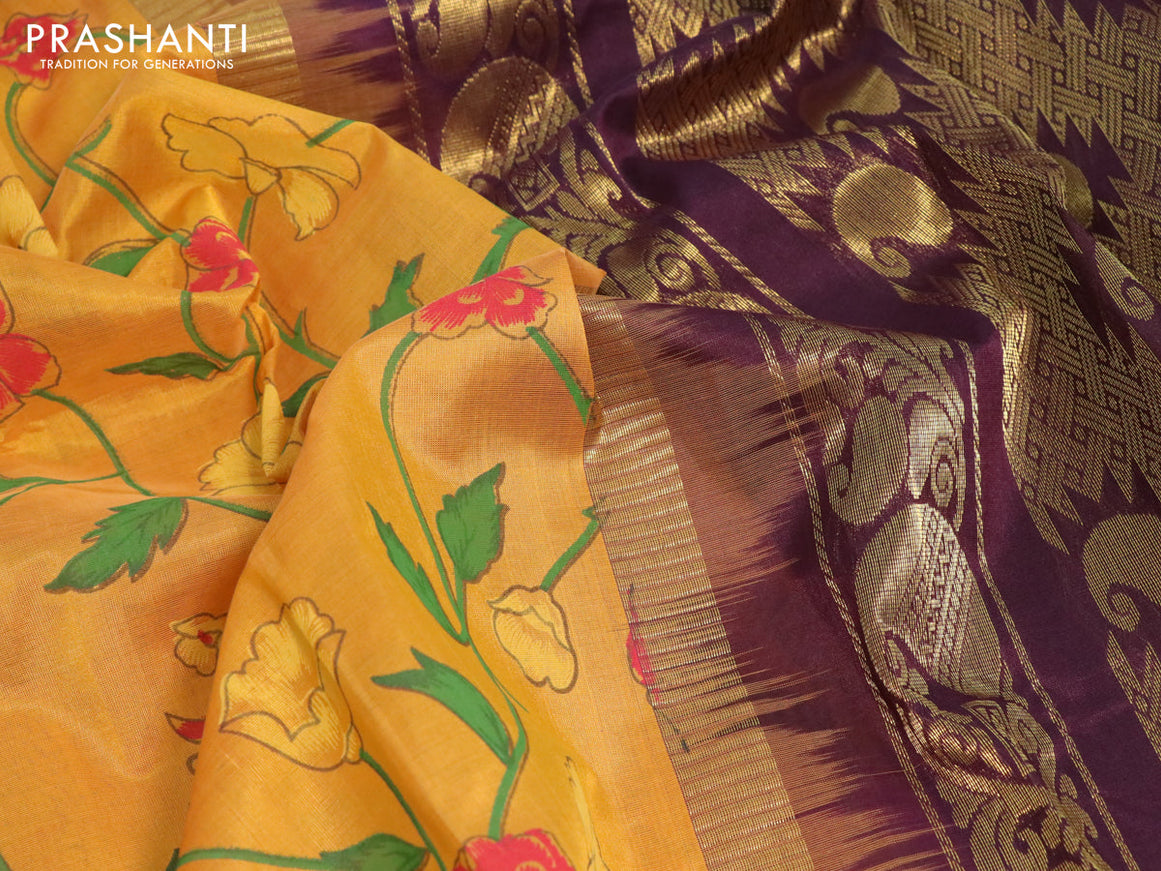 Silk cotton saree mustard yellow and brown with floral prints and temple design zari woven simple border