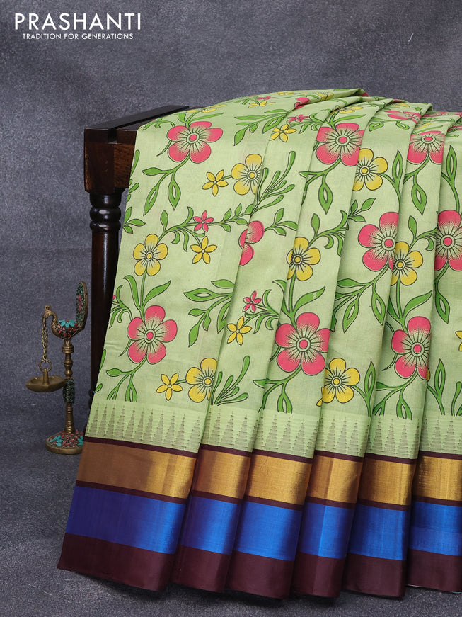Silk cotton saree pista green and brown with floral prints and temple design zari woven simple border