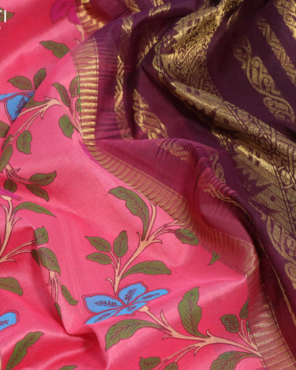 Silk cotton saree peach pink and deep wine shade with allover floral prints and zari woven korvai border