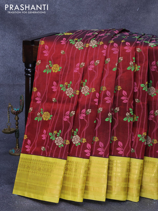 Silk cotton saree maroon and lime yellow with allover floral prints and paisley zari woven korvai border