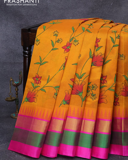 Silk cotton saree mustard yellow and pink with allover floral prints and temple design zari woven simple border