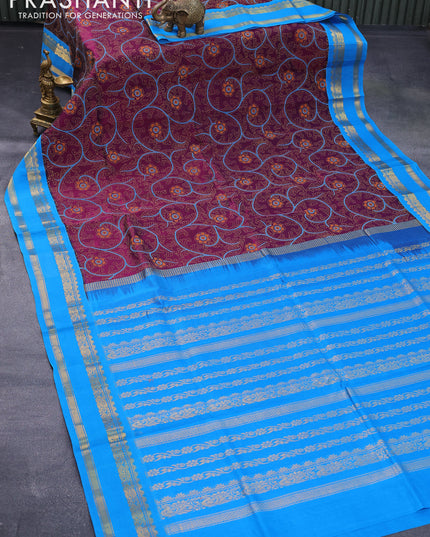 Silk cotton saree wine shade and cs blue with allover kalamkari prints and rettapet zari woven korvai border
