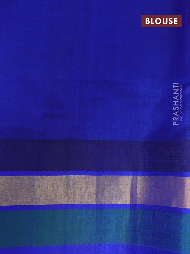 Silk cotton saree red and blue with allover floral prints and temple design zari woven simple border