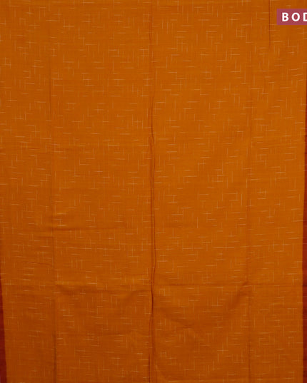Bengal soft cotton saree mustard yellow and rust shade with allover checked pattern and ikat woven border