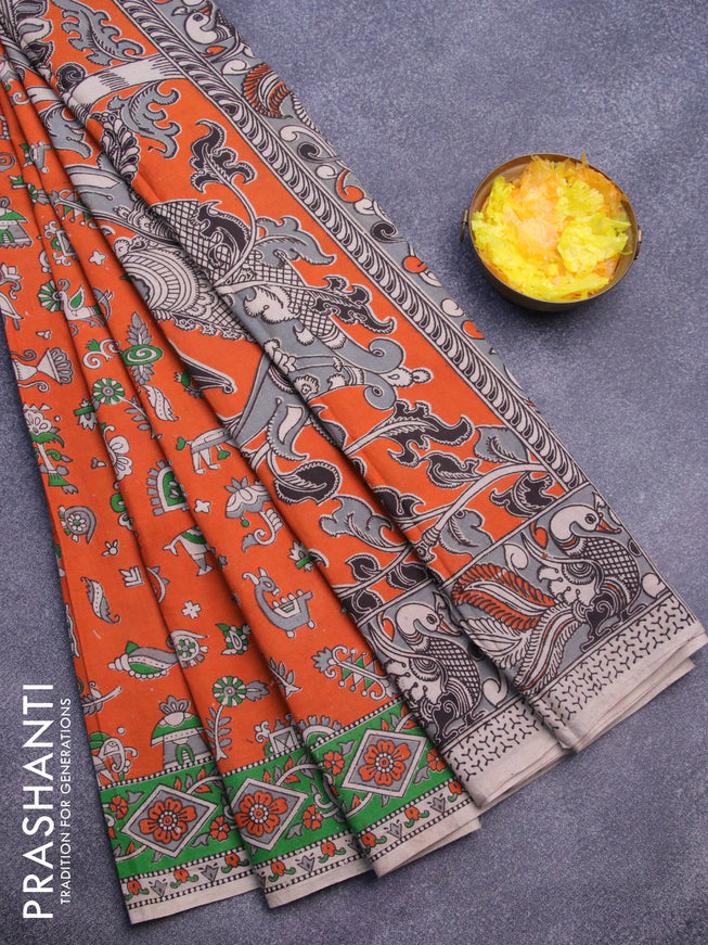 Kalamkari cotton saree orange and green with allover prints and printed border