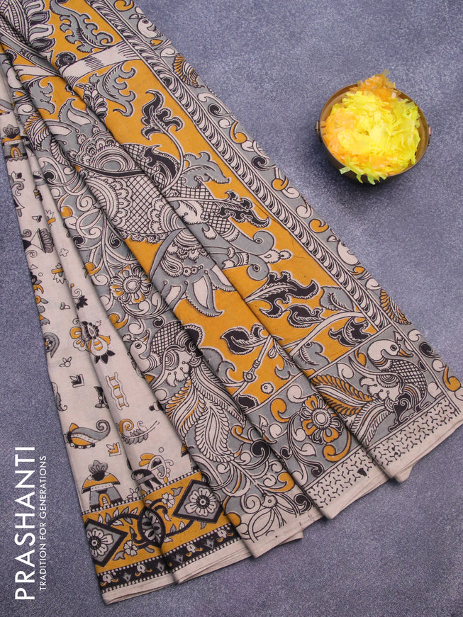 Kalamkari cotton saree beige and yellow with allover prints and printed border