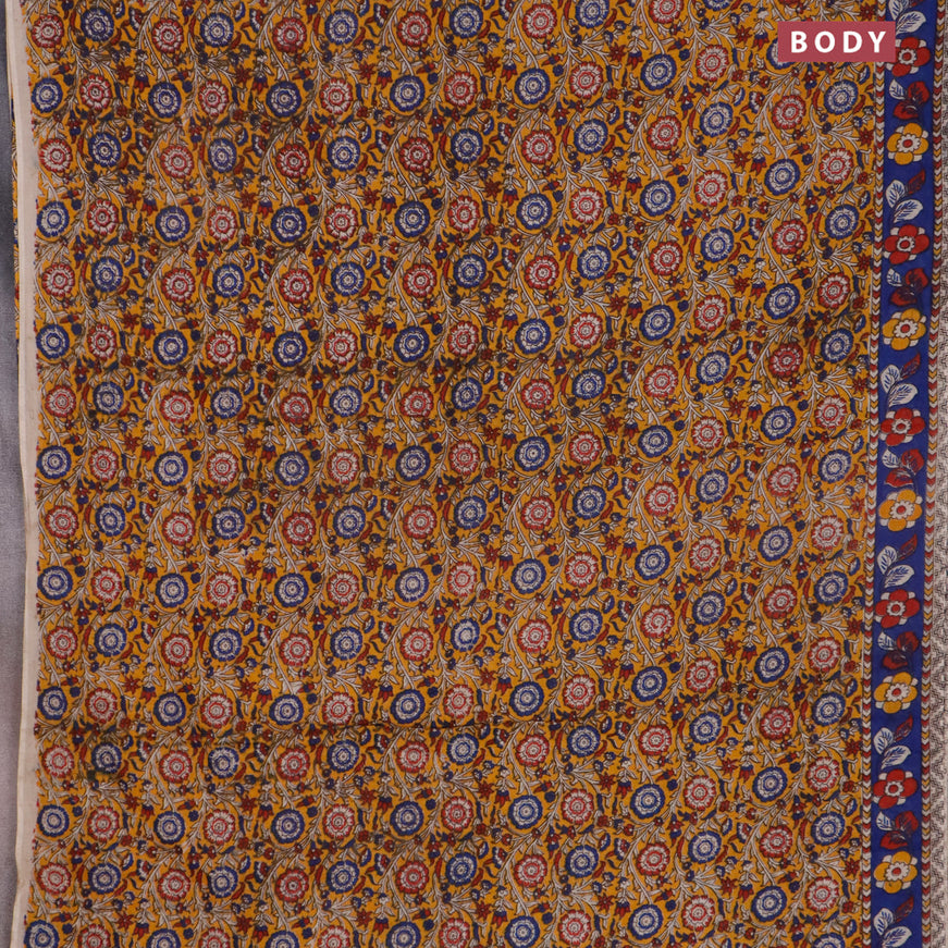 Kalamkari cotton saree yellow and blue with allover prints and printed border