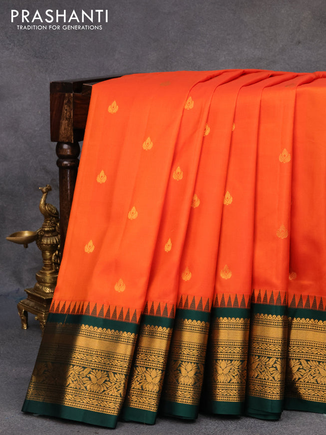 Pure gadwal silk saree orange and dark green with zari woven buttas and temple design zari woven border