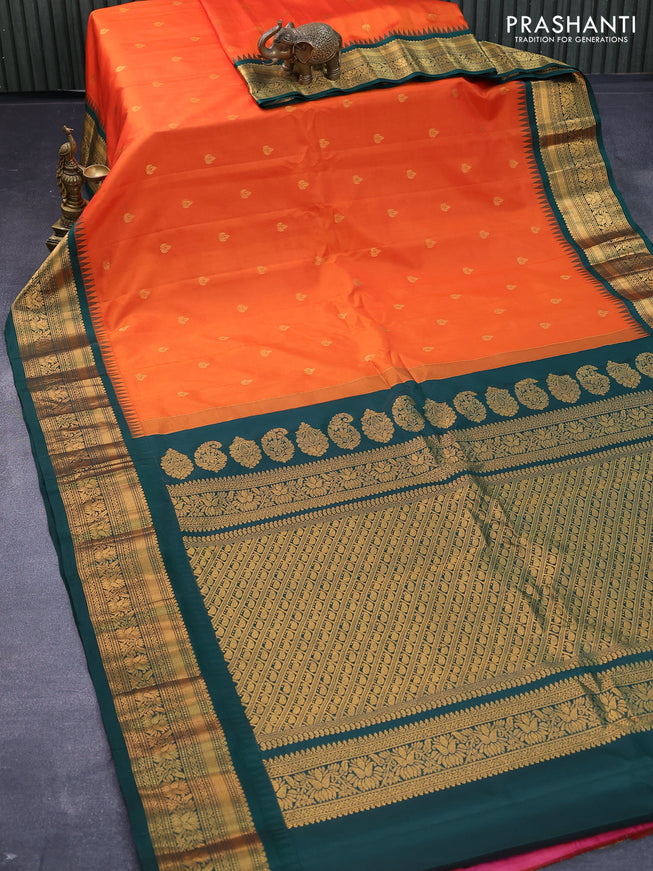 Pure gadwal silk saree orange and dark green with zari woven buttas and temple design zari woven border
