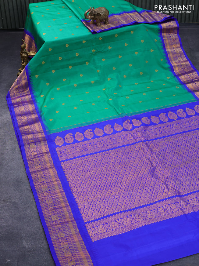 Pure gadwal silk saree green and blue with zari woven buttas and temple design zari woven border
