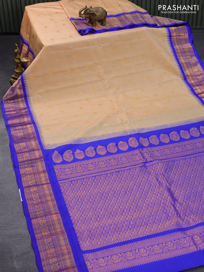 Pure gadwal silk saree sandal and blue with zari woven buttas and temple design zari woven border