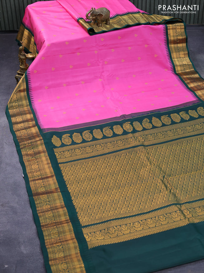 Pure gadwal silk saree light pink and dark green with zari woven buttas and temple design zari woven border