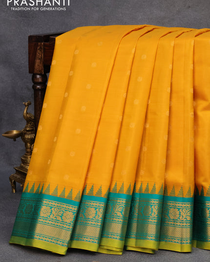 Pure gadwal silk saree mustard yellow and green with zari woven buttas and temple design zari woven border