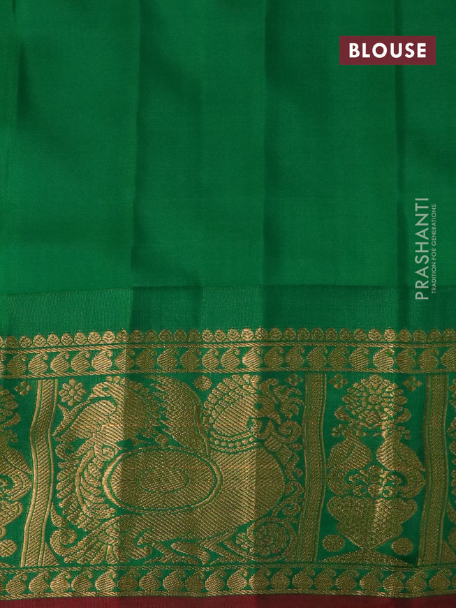 Pure gadwal silk saree orange and green with zari woven buttas and temple design annam zari woven border