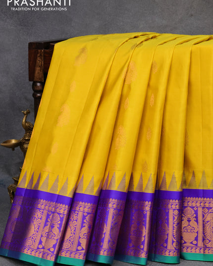 Pure gadwal silk saree yellow and blue with zari woven buttas and temple design annam zari woven border