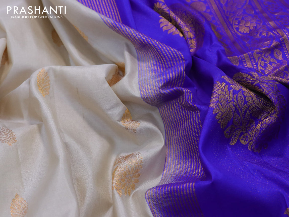 Pure gadwal silk saree grey shade and royal blue with paisley zari woven buttas and temple design annam zari woven border