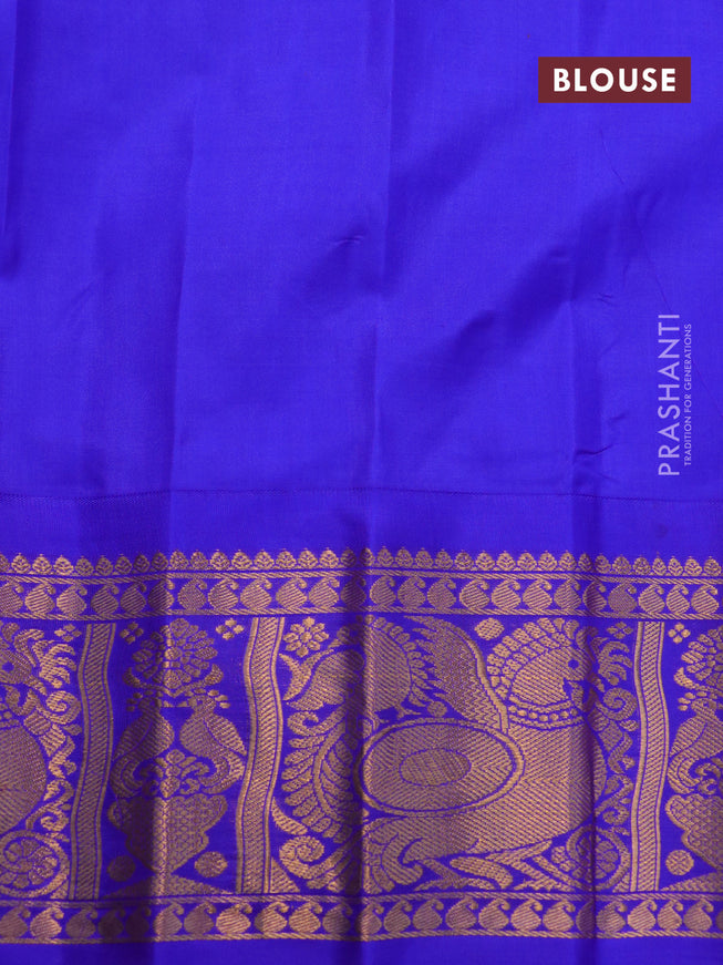 Pure gadwal silk saree grey shade and royal blue with paisley zari woven buttas and temple design annam zari woven border