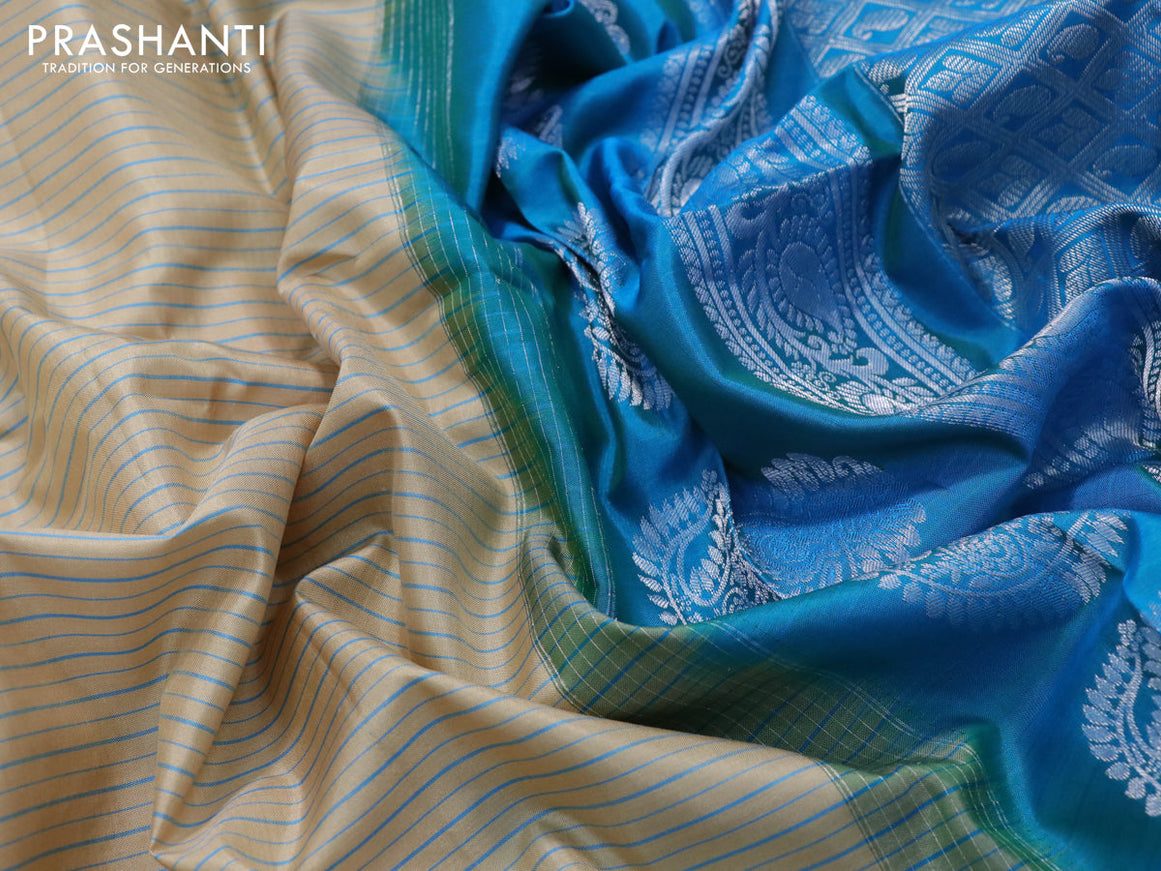 Pure gadwal silk saree sandal and cs blue with allover stripes pattern and rettapet silver zari woven border