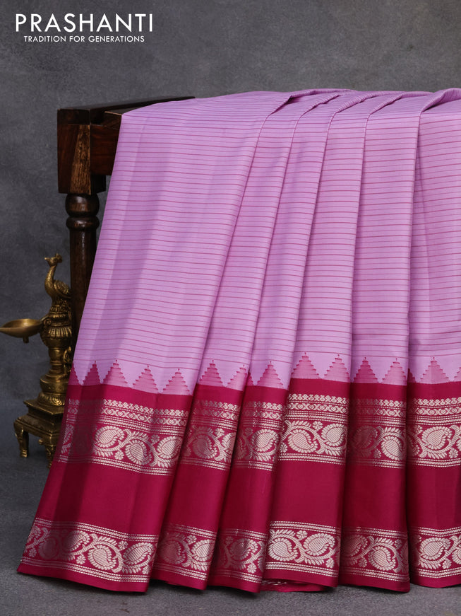 Pure gadwal silk saree mild purple and purple with allover stripes pattern and rettapet silver zari woven border