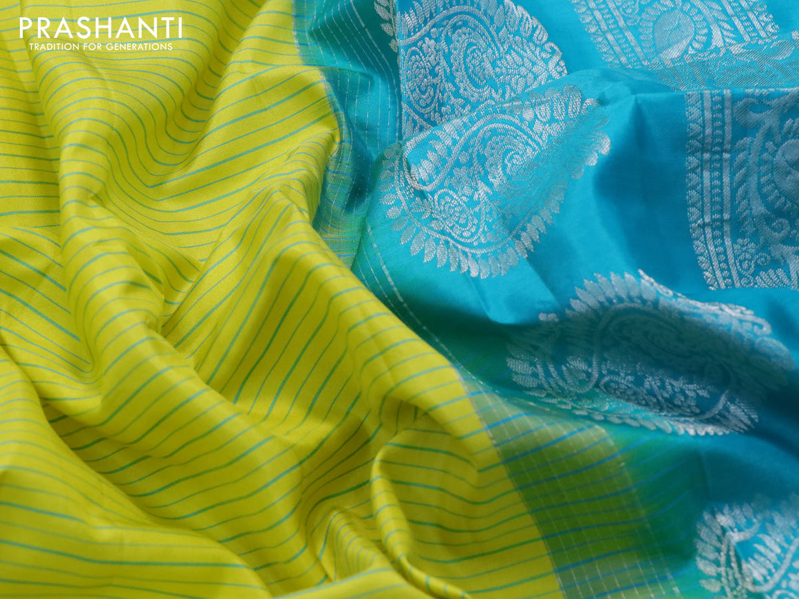 Pure gadwal silk saree lime yellow and teal blue with allover stripes pattern and rettapet silver zari woven border