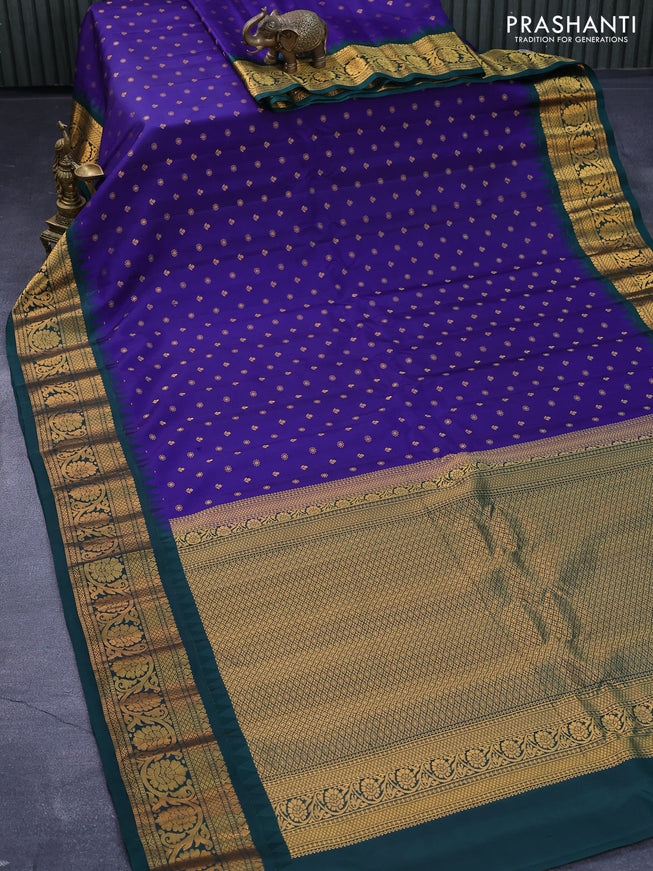 Pure gadwal silk saree blue and dark green with allover zari woven buttas and temple design zari woven floral border