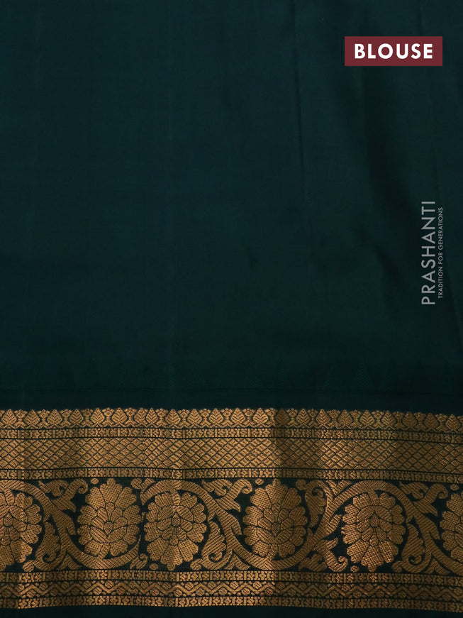 Pure gadwal silk saree blue and dark green with allover zari woven buttas and temple design zari woven floral border