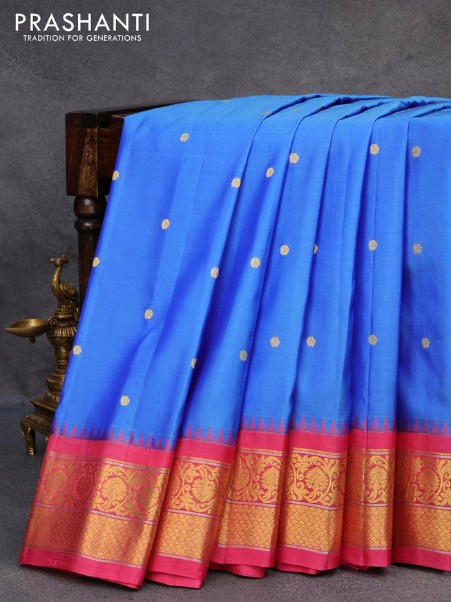 Pure gadwal silk saree blue shade and pink with allover zari woven buttas and temple design zari woven floral border