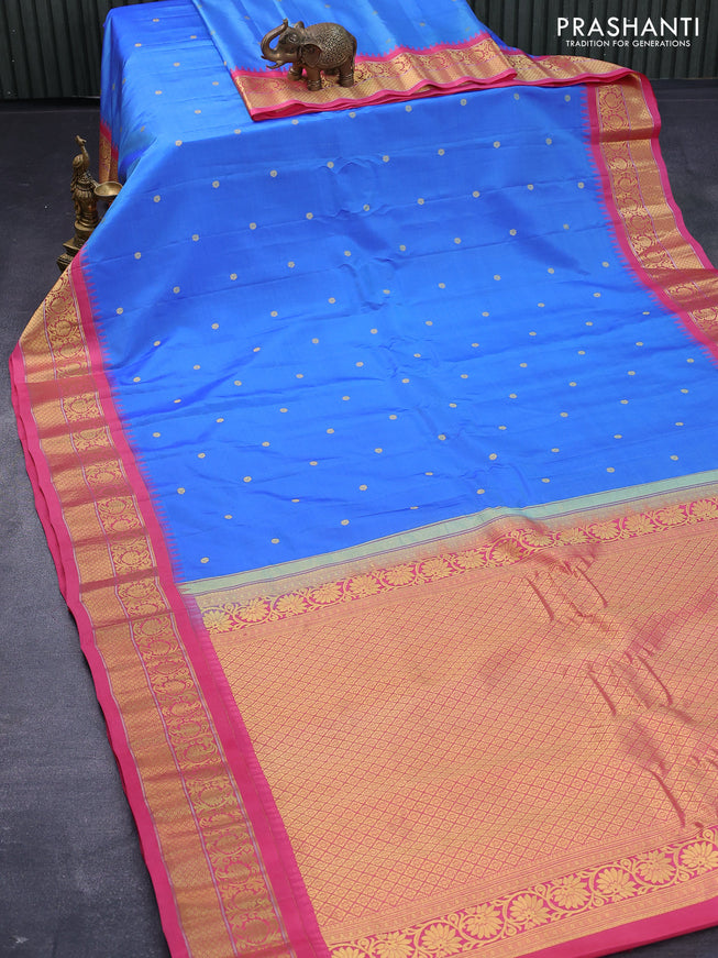 Pure gadwal silk saree blue shade and pink with allover zari woven buttas and temple design zari woven floral border