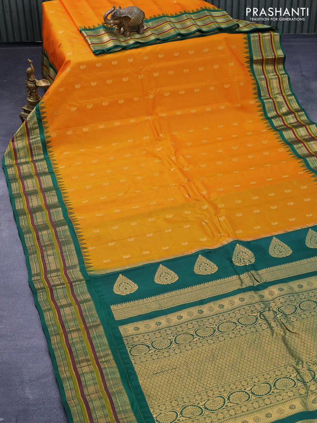 Pure gadwal silk saree orange and green with zari woven paisley buttas and temple design zari woven border