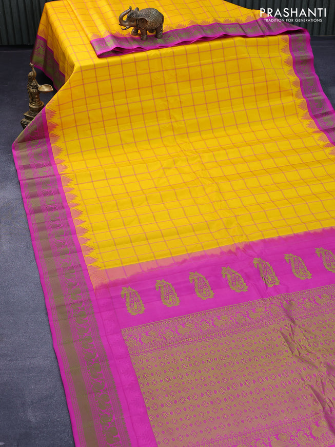 Pure gadwal silk saree mango yellow and magenta pink with allover checked pattern and temple design thread woven border