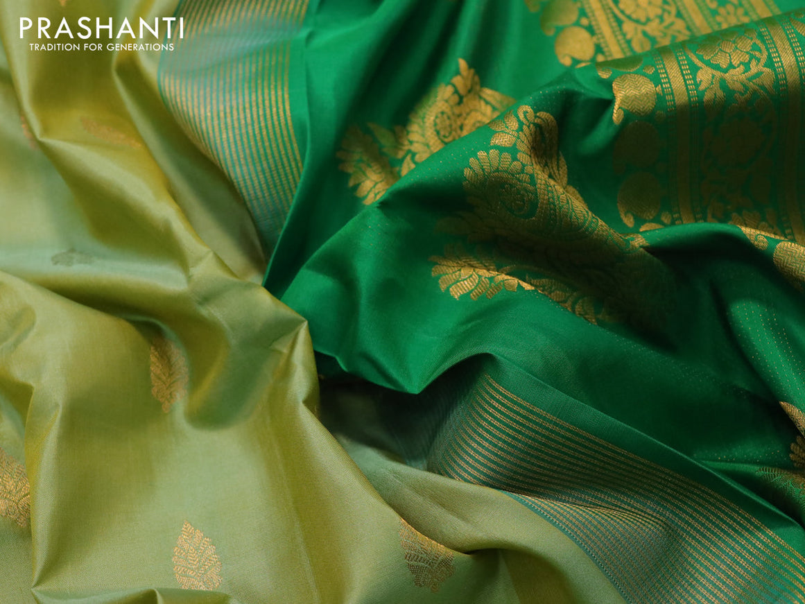 Pure gadwal silk saree dual shade of yellowish green and maroon with zari woven buttas and temple design annam zari woven border