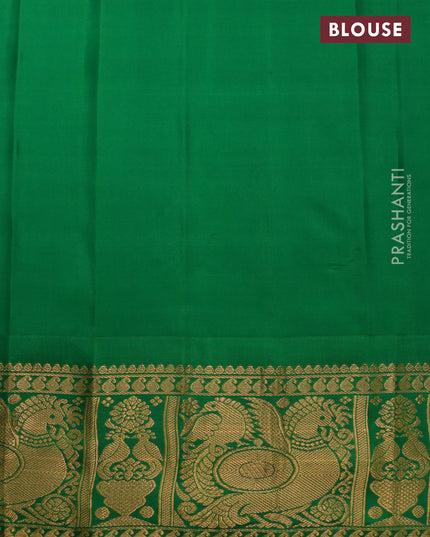 Pure gadwal silk saree dual shade of yellowish green and maroon with zari woven buttas and temple design annam zari woven border