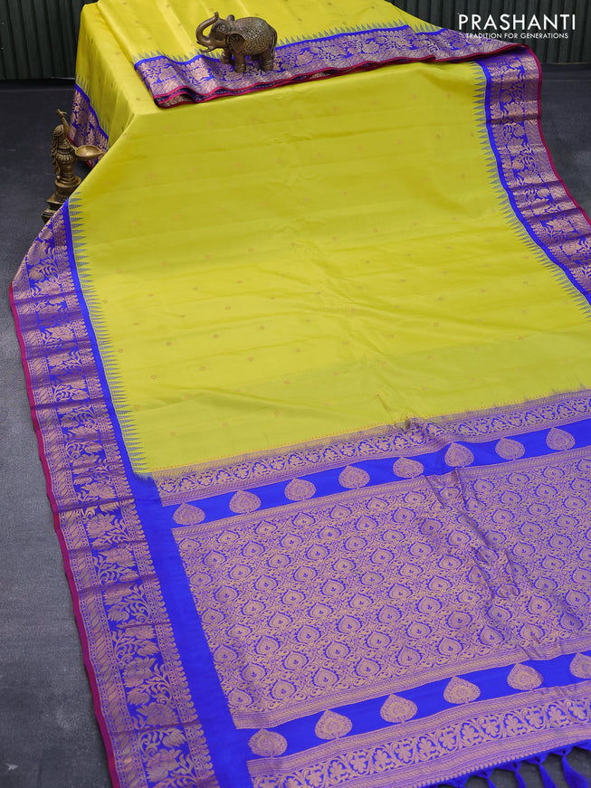 Pure gadwal silk saree lime yellow and blue with zari woven buttas and temple design floral zari woven border