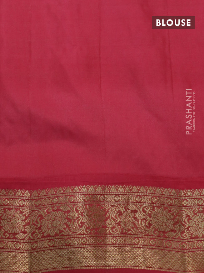 Pure gadwal silk saree black and peach pink with allover zari checks & buttas and zari woven border