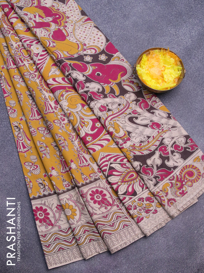 Kalamkari cotton saree mustard yellow and beige with allover prints and printed border