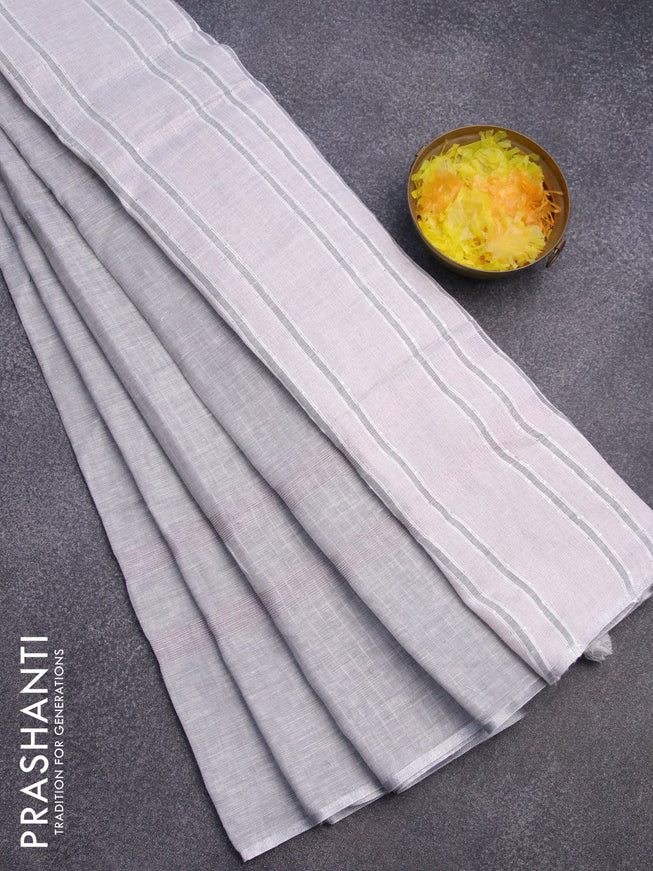 Pure linen saree pastel grey with plain body and silver zari woven piping border